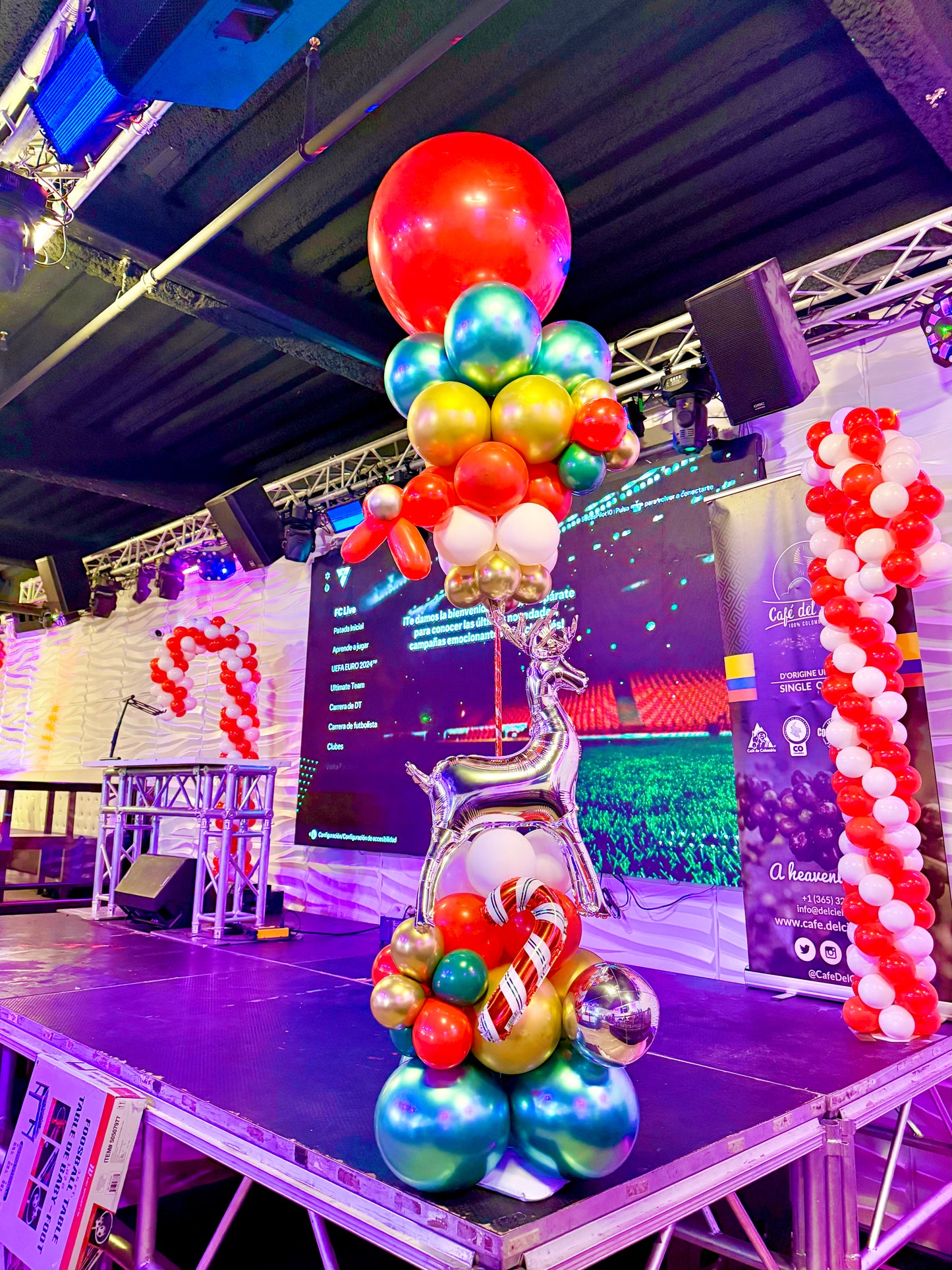 Christmas Balloon Pillar decorated with festive holiday balloons
