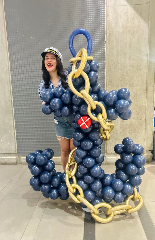 Freestanding Balloon Anchor Sculpture with navy, gold, and red biodegradable balloons.