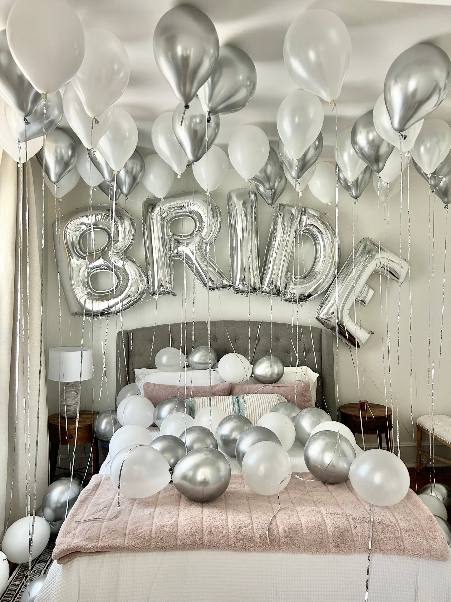 Bride WOW Decor with ceiling balloons, floor balloons, and "BRIDE" letter arch.