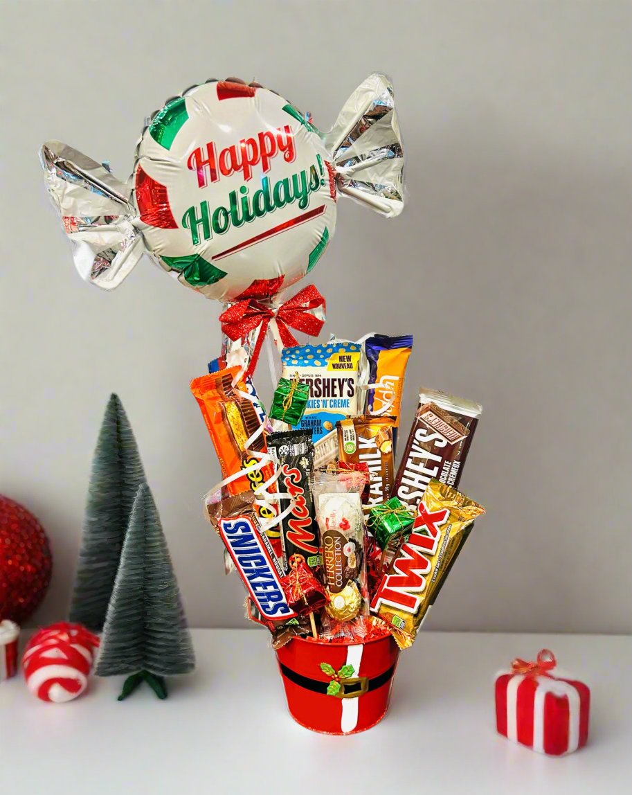 Christmas Chocolate Basket with 10 chocolates, a small Christmas balloon, and festive packaging.