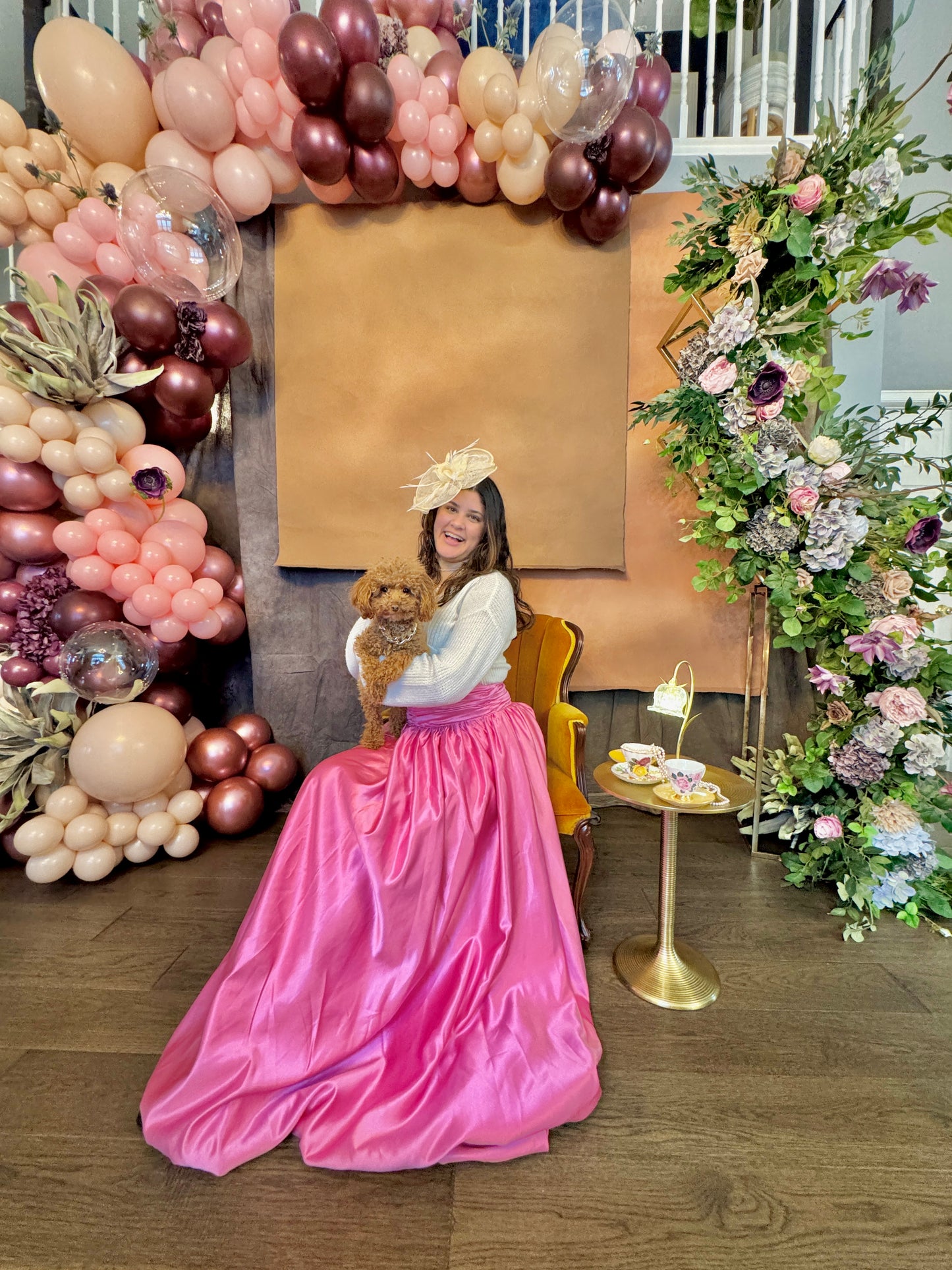 Luxury spring floral balloon garland with blush, gold, and greenery for elegant event decor.