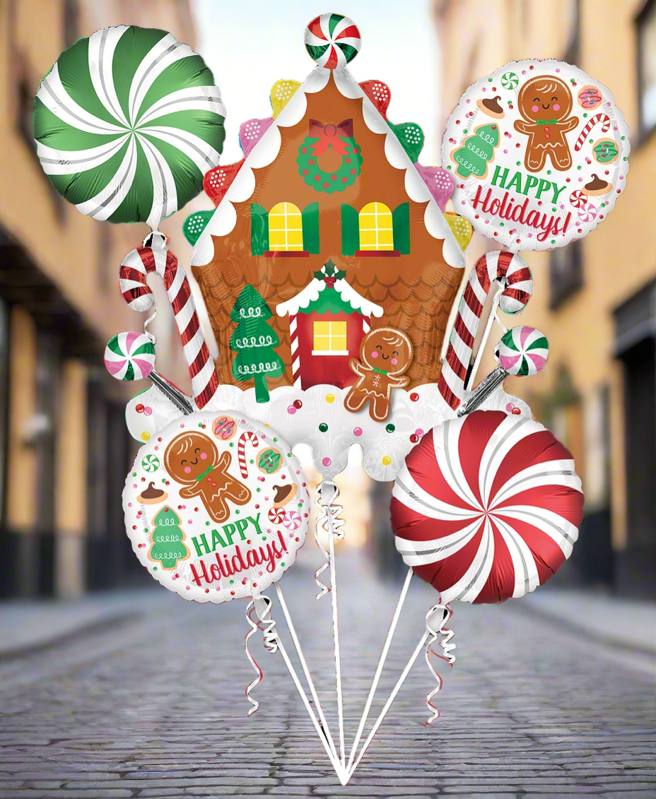Gingerbread House Package – Festive balloon arrangement featuring a super shape gingerbread house and round foil balloons