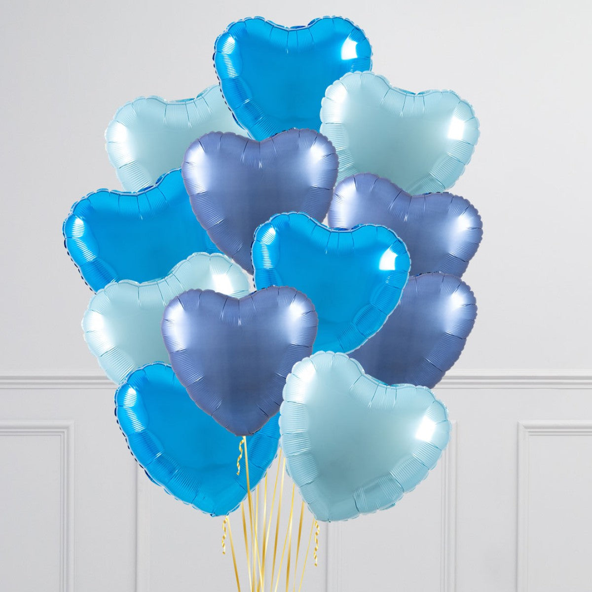 A bouquet of colorful 17-inch helium-filled heart balloons in various colors for same-day delivery in Toronto.