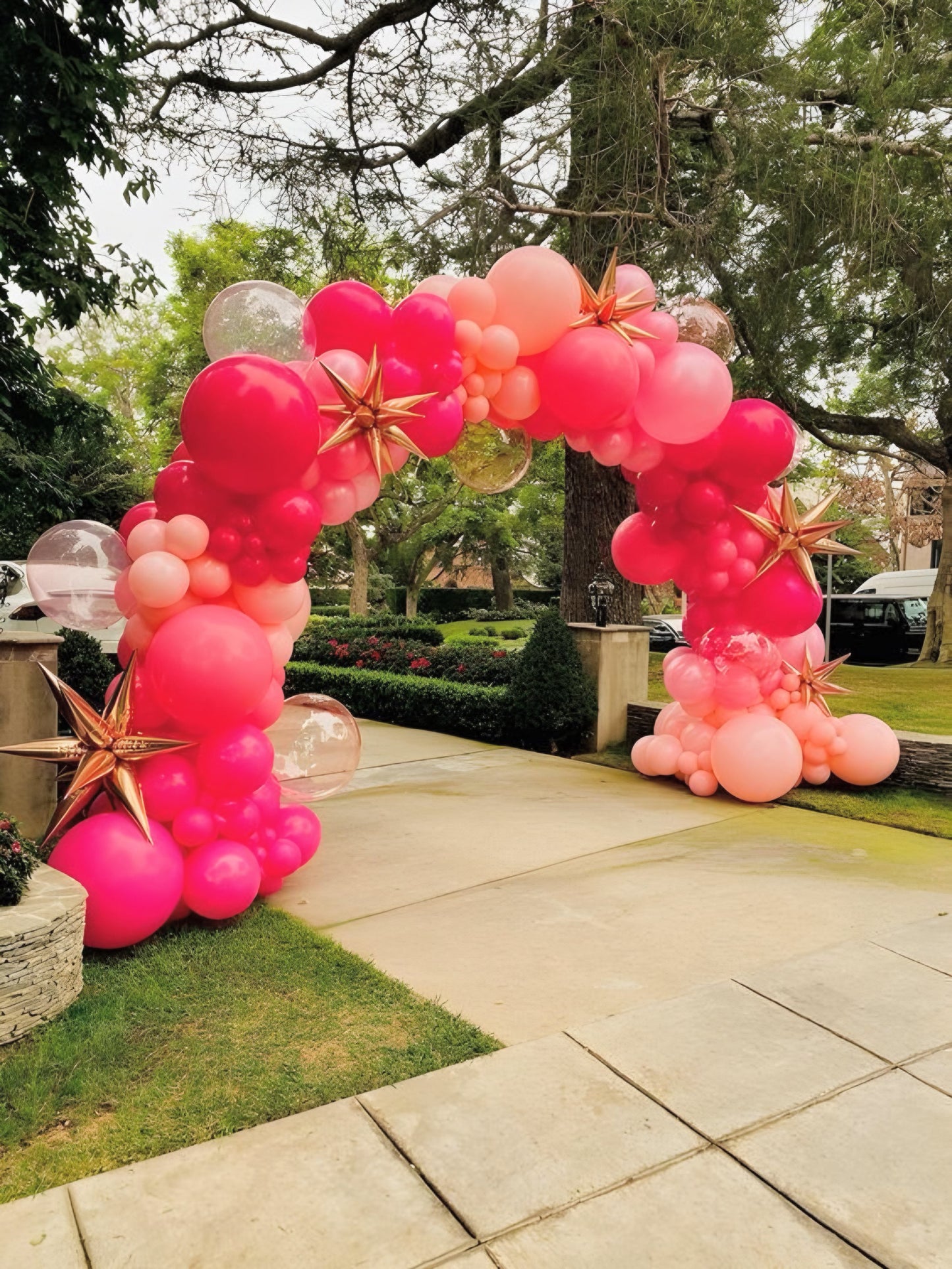 Modern Organic Balloon Arch Display with multi-sized balloons and a sturdy structure for events in Toronto