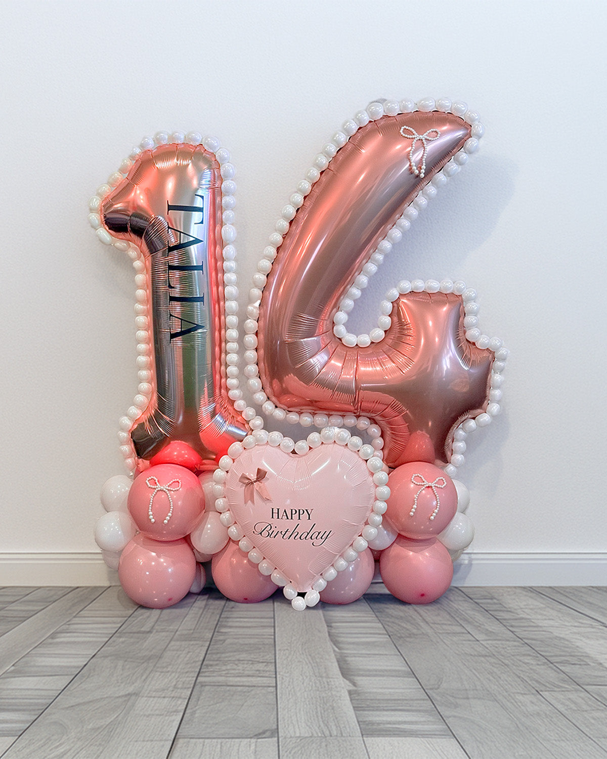 Personalized Number Balloon Arrangement Toronto – elegant pink and rose gold birthday balloon display with custom name and heart balloon by Wooow Balloons