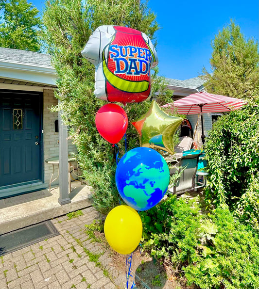 Super Dad helium balloon bouquet with T-shirt balloon, star balloon, world balloon, and regular latex balloons.