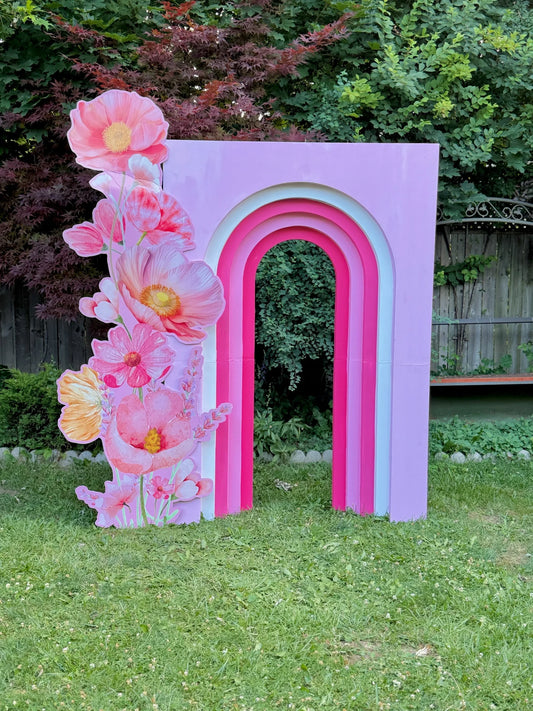 Birthday rainbow arch balloon backdrop in pastel pink tones – event decor and rentals in Toronto by Wooow Balloons.