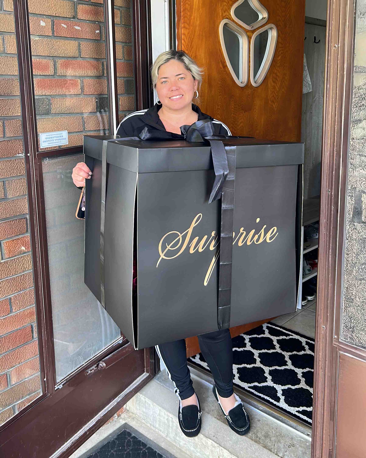 Black surprise balloon gift box delivery in Toronto – luxury birthday surprise box with ribbon by Wooow Balloons