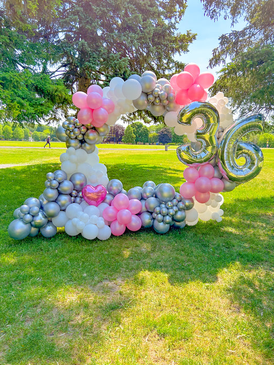 Full Balloon Arch in Toronto featuring a gold metal frame and biodegradable balloons for events.