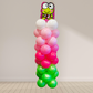 Balloon sculpture with a character on top against a plain background