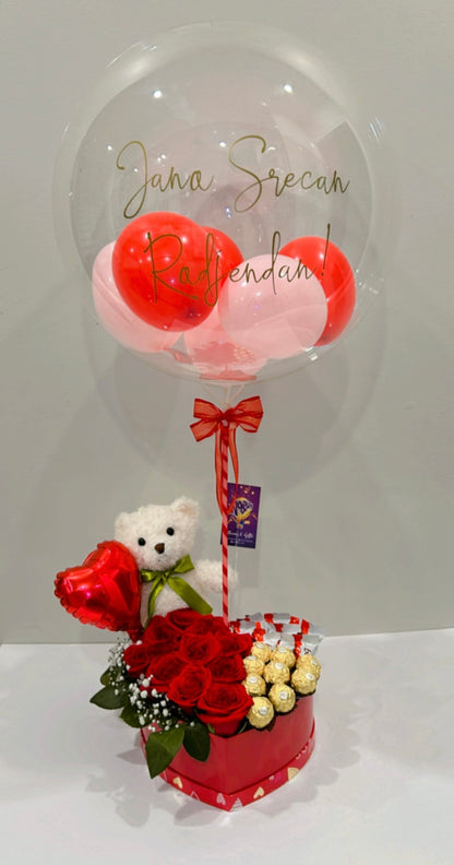 Beautiful Heart Surprise gift set featuring roses, chocolates, a teddy bear, and a bobo balloon with a custom message.
