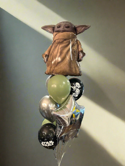 Star Wars-themed Baby Yoda Balloon Bouquet with a Grogu (Baby Yoda) balloon, featuring silver, black, and green balloons for a fun celebration.