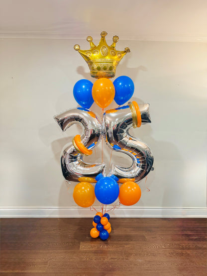 Balloon arrangement with number '35' and crown on a plain background Toronto Balloons