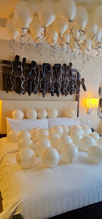 Creamy Blush Birthday Room Decor with helium balloons, banner, and number stands Toronto