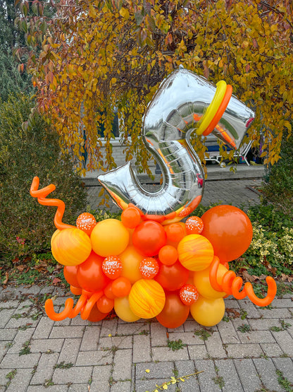 Birthday Number Balloon Arrangement with a silver number balloon and customizable balloon colors for a festive celebration.