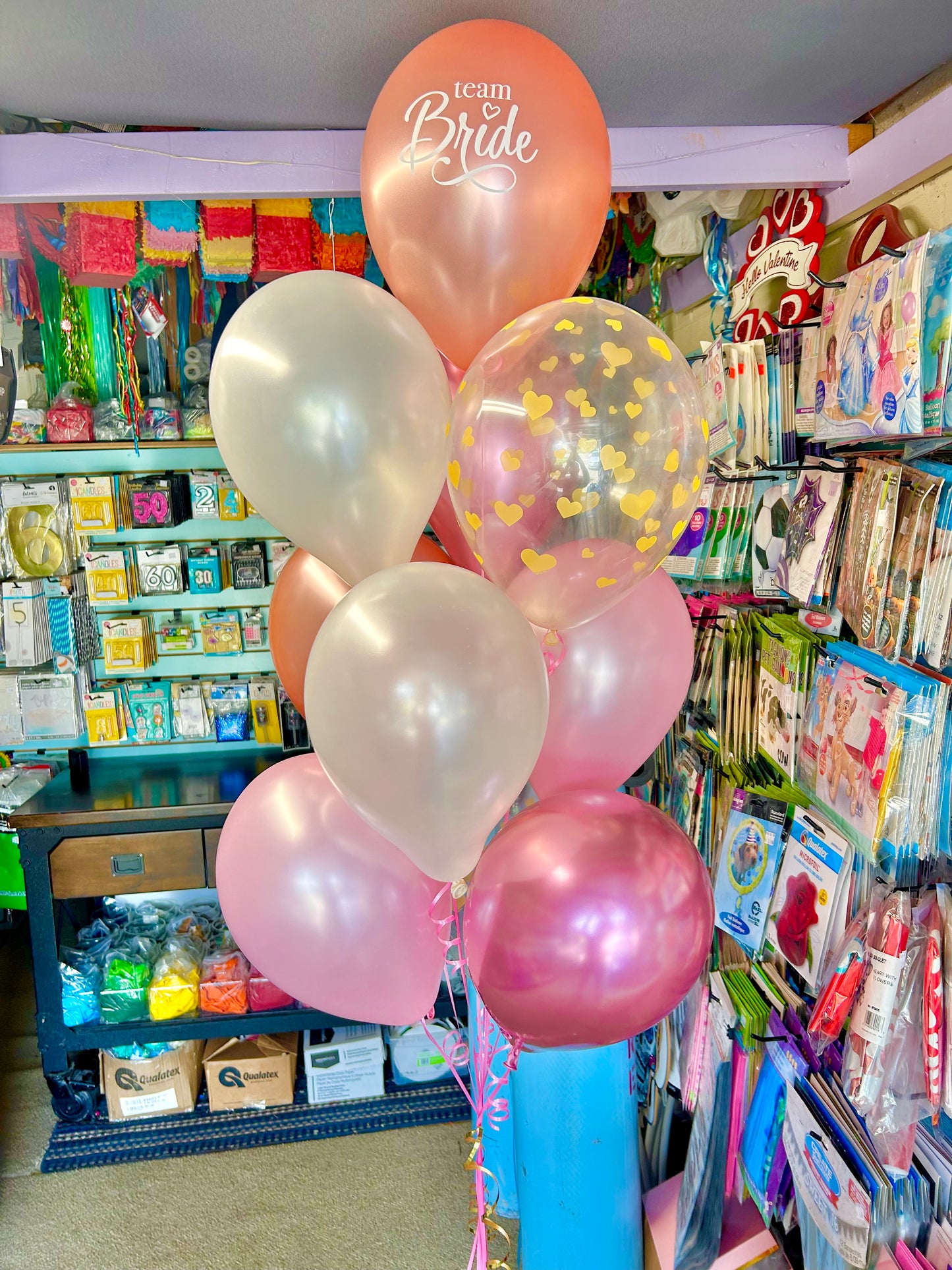 Bride Balloon Bouquet with helium-filled biodegradable balloons in a bunch of 7, including balloon weight and transport bag.