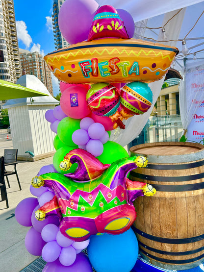 Carnival Balloon Garlands with vibrant colors and foil balloons for events in Toronto.