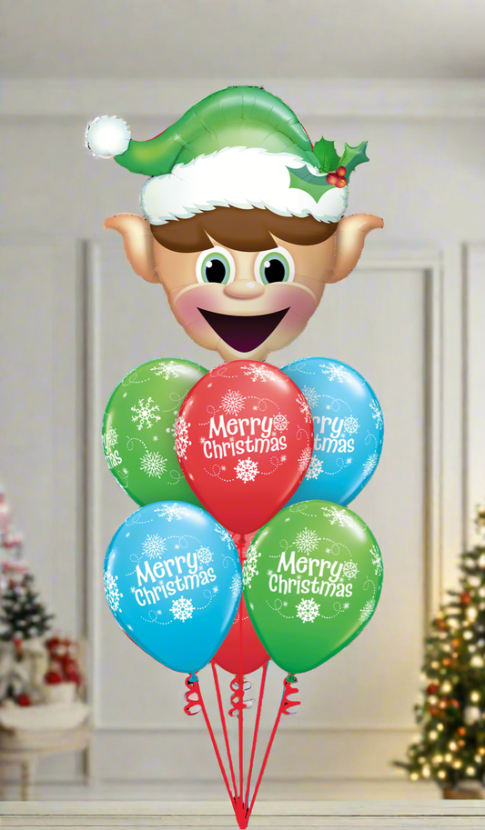 A festive Elf Balloon Bouquet featuring a 34-inch Elf super shape balloon with 6 smaller balloons, complete with a weight and transportation bag.