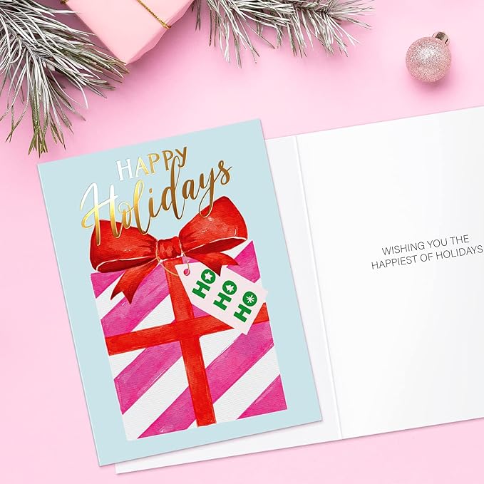Christmas card with a red bow and gift box design on a pink background