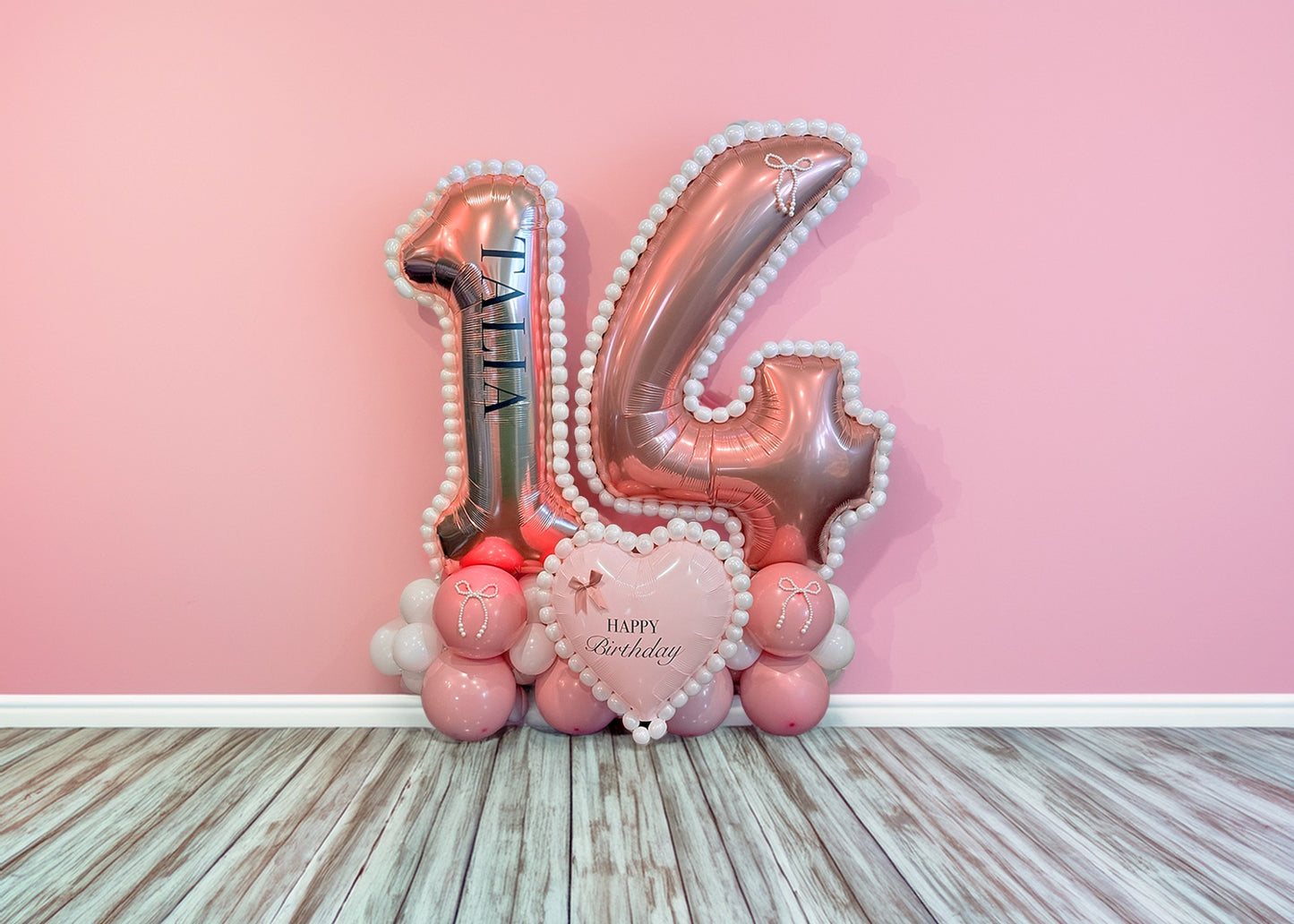 Coquette Balloon Stand Toronto – Luxury pink and white 14th birthday balloon stand with heart balloon and elegant bow accents by Wooow Balloons Toronto.