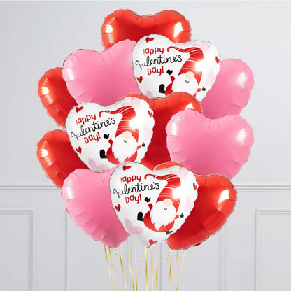 A dozen 17-inch heart-shaped foil balloons, helium-filled with a balloon weight.