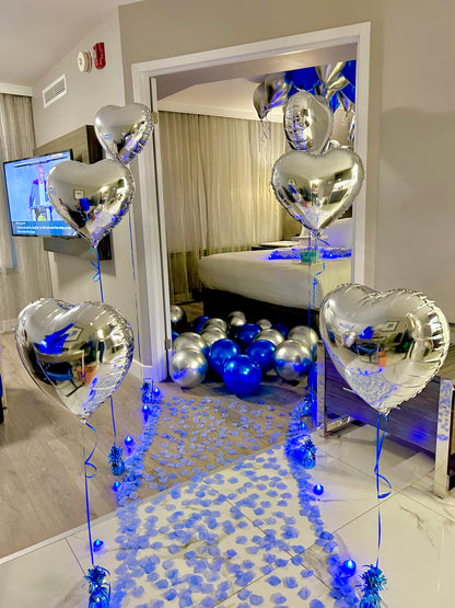 Blue & Silver Happy Birthday Balloon Decor with helium balloons, banner, and number stands.