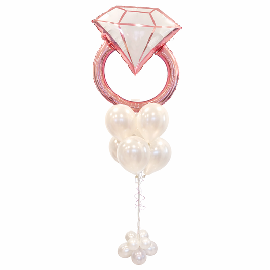 Engagement party balloons Toronto – large rose gold diamond ring balloon arrangement with pearl white latex balloons studio style