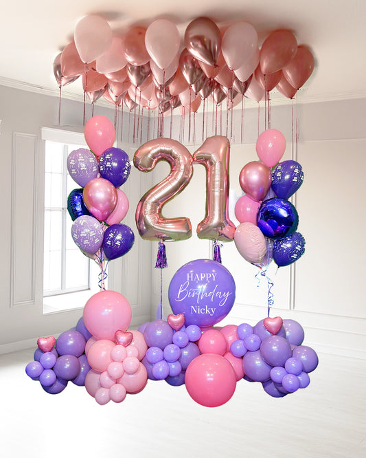 Extremely Wooow Birthday Package Toronto – luxury balloon decoration with pink and purple garlands, ceiling balloons, and number 21 setup by Wooow Balloons