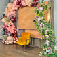 Luxury spring floral balloon garland with blush, gold, and greenery for elegant event decor.