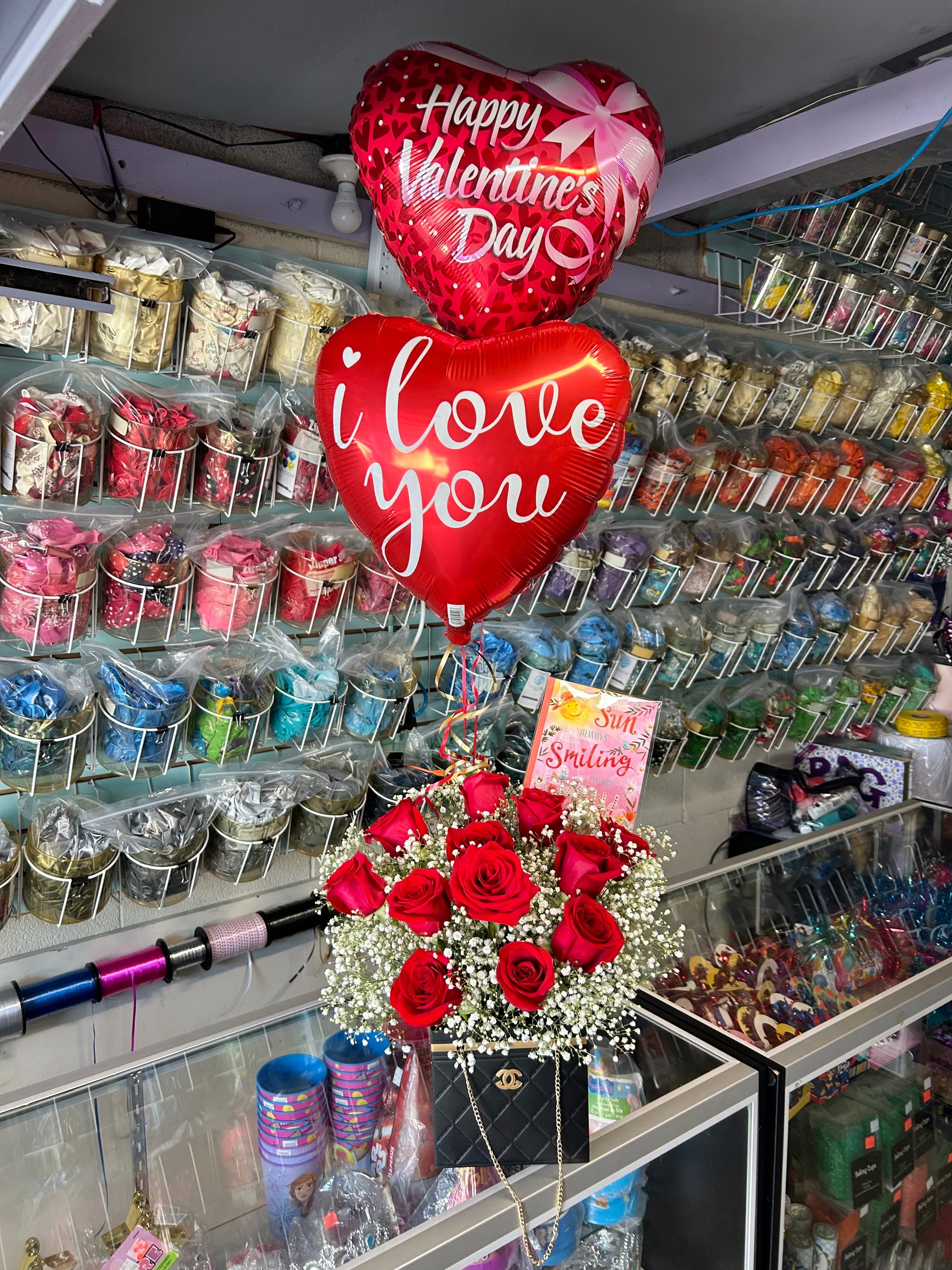 Fresh Red Roses Purse with heart balloons and card – Valentine’s Day gift arrangement in Toronto