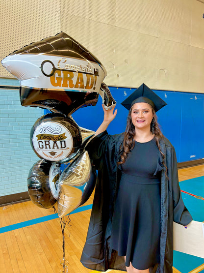 Grad Balloon Bouquet with helium-filled balloons, including a cap balloon, stars, and foil rounds.