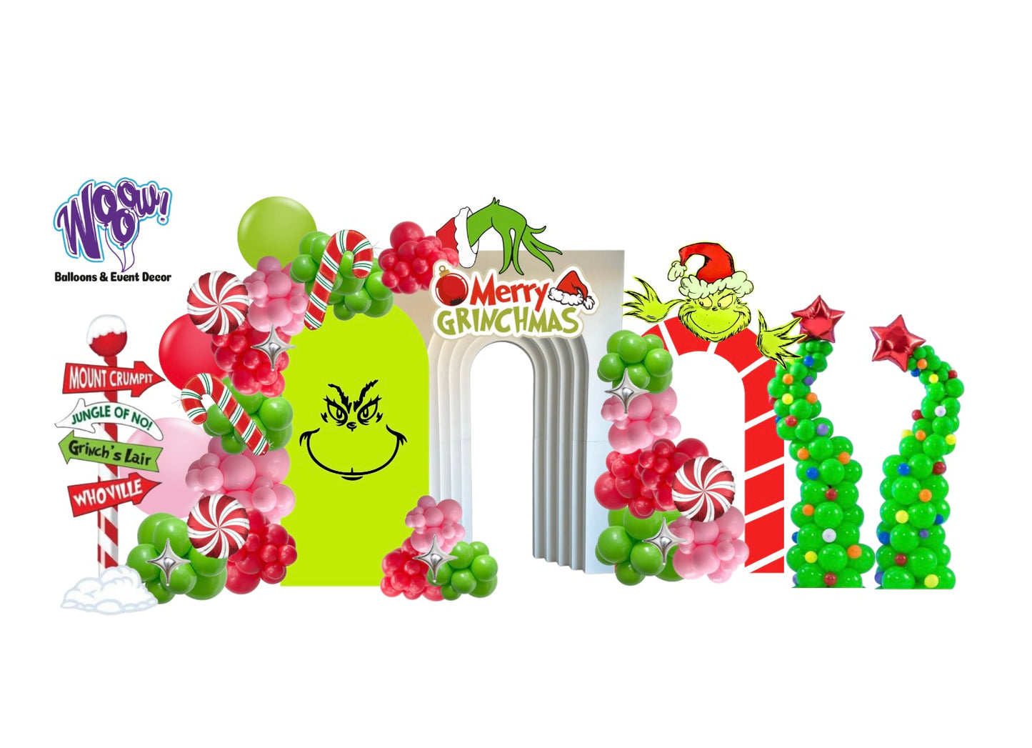 Grinch Decor Setup with balloon garlands, 3D backdrop, and Grinch-themed signs