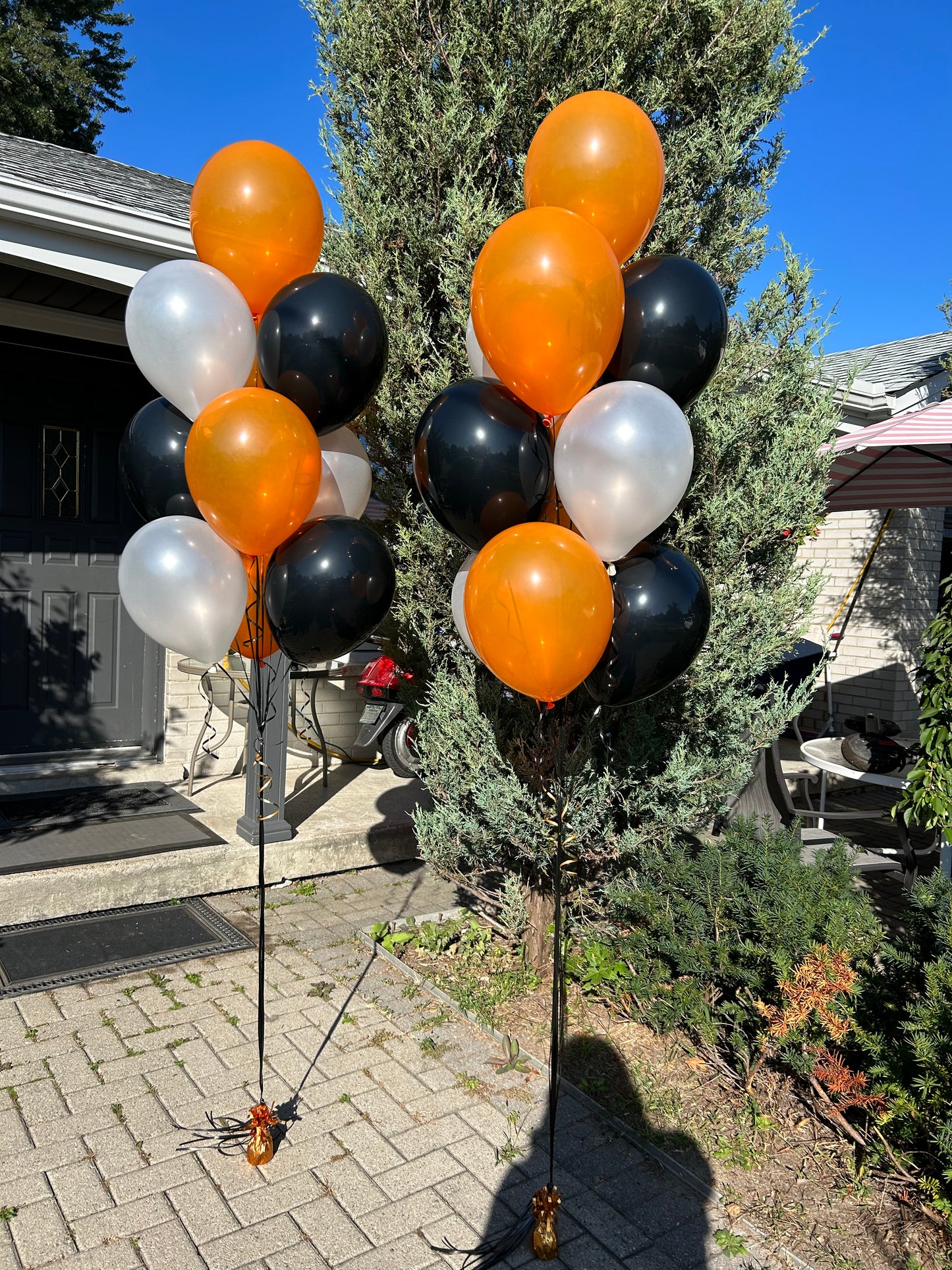 Custom Halloween Balloon Bouquets with helium-filled biodegradable balloons.