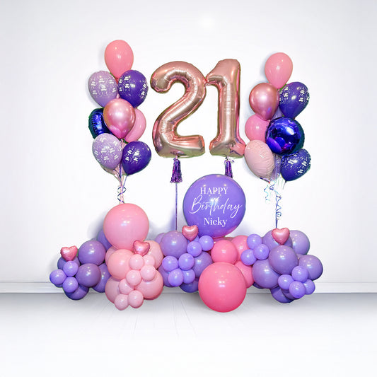 Happy Birthday Balloons Toronto – luxury pink and purple balloon setup with number balloons, heart accents, and personalized birthday sign by Wooow Balloons