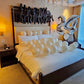 Creamy Blush Birthday Room Decor with helium balloons, banner, and number stands.