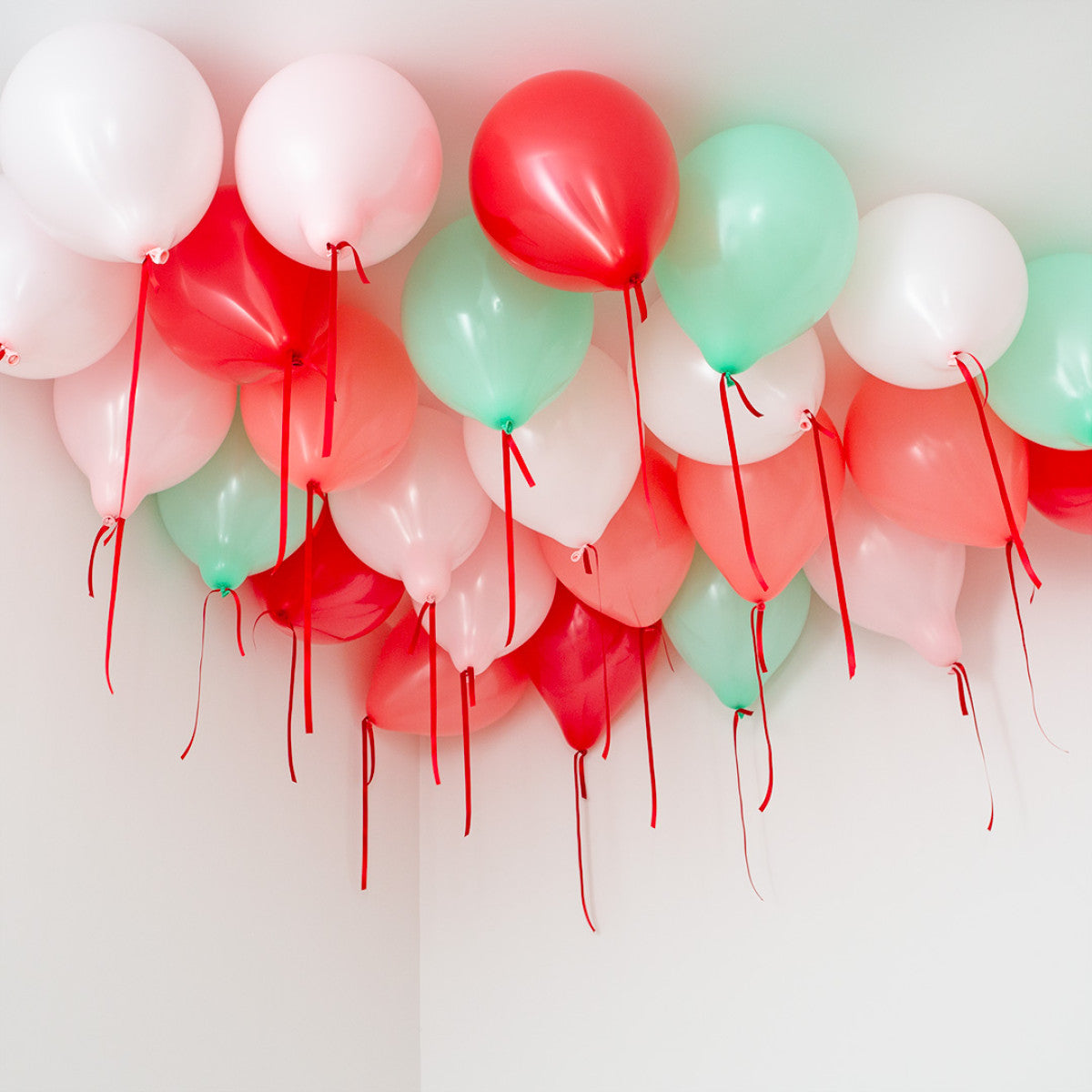 25 Candy Cane Ceiling Balloons with satin ribbons, pre-inflated with helium, ready to hang.