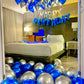 Blue & Silver Happy Birthday Balloon Decor with helium balloons, banner, and number stands.