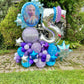 Frozen-themed balloon arrangement with Elsa and number balloon for a birthday celebration.