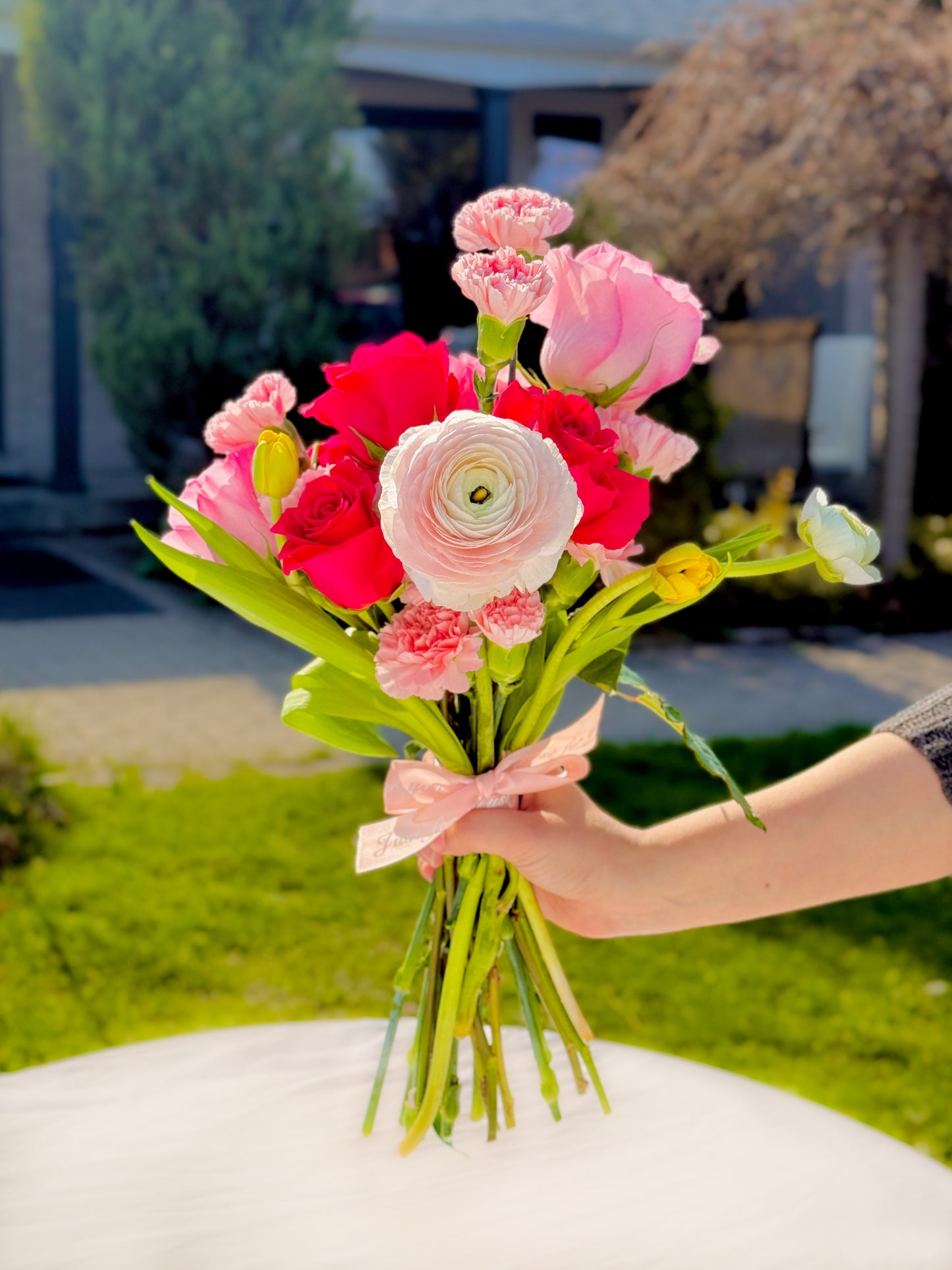 Hand-tied Mother’s Day flower bouquet with gerberas and seasonal blooms – jar not included