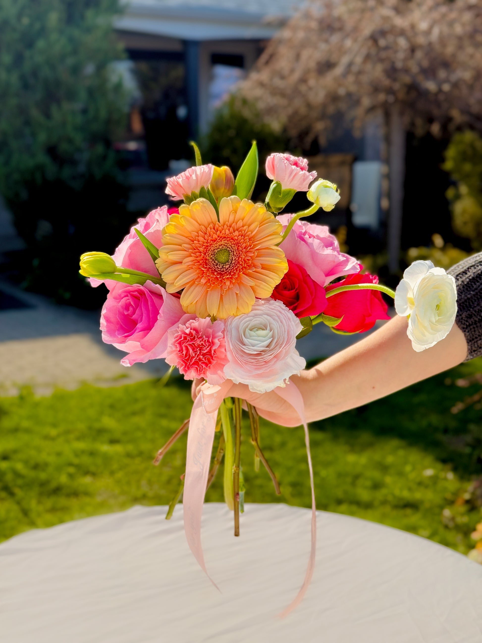 Hand-tied Mother’s Day flower bouquet with gerberas and seasonal blooms – jar not included