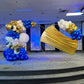 Luxury Soccer Balloon Backdrop with a gold arch, blue and white balloon arrangement, and soccer-themed decorations for a sports event.