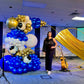 Luxury Soccer Balloon Backdrop with a gold arch, blue and white balloon arrangement, and soccer-themed decorations for a sports event.