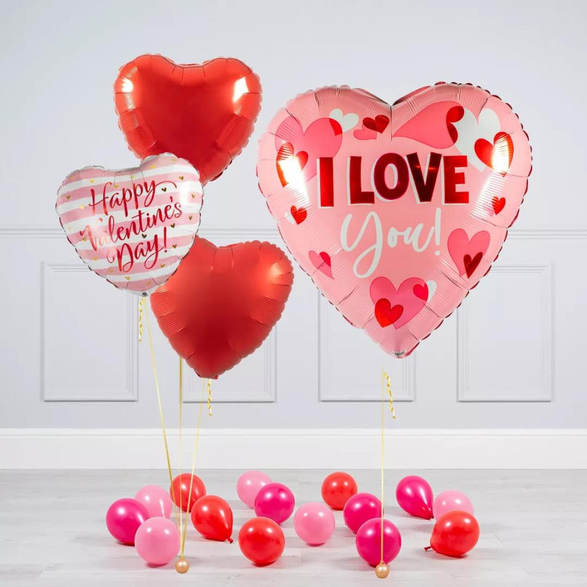 I Love You Balloon Bundle featuring heart-shaped balloons in red and pink, perfect for Valentine’s Day.