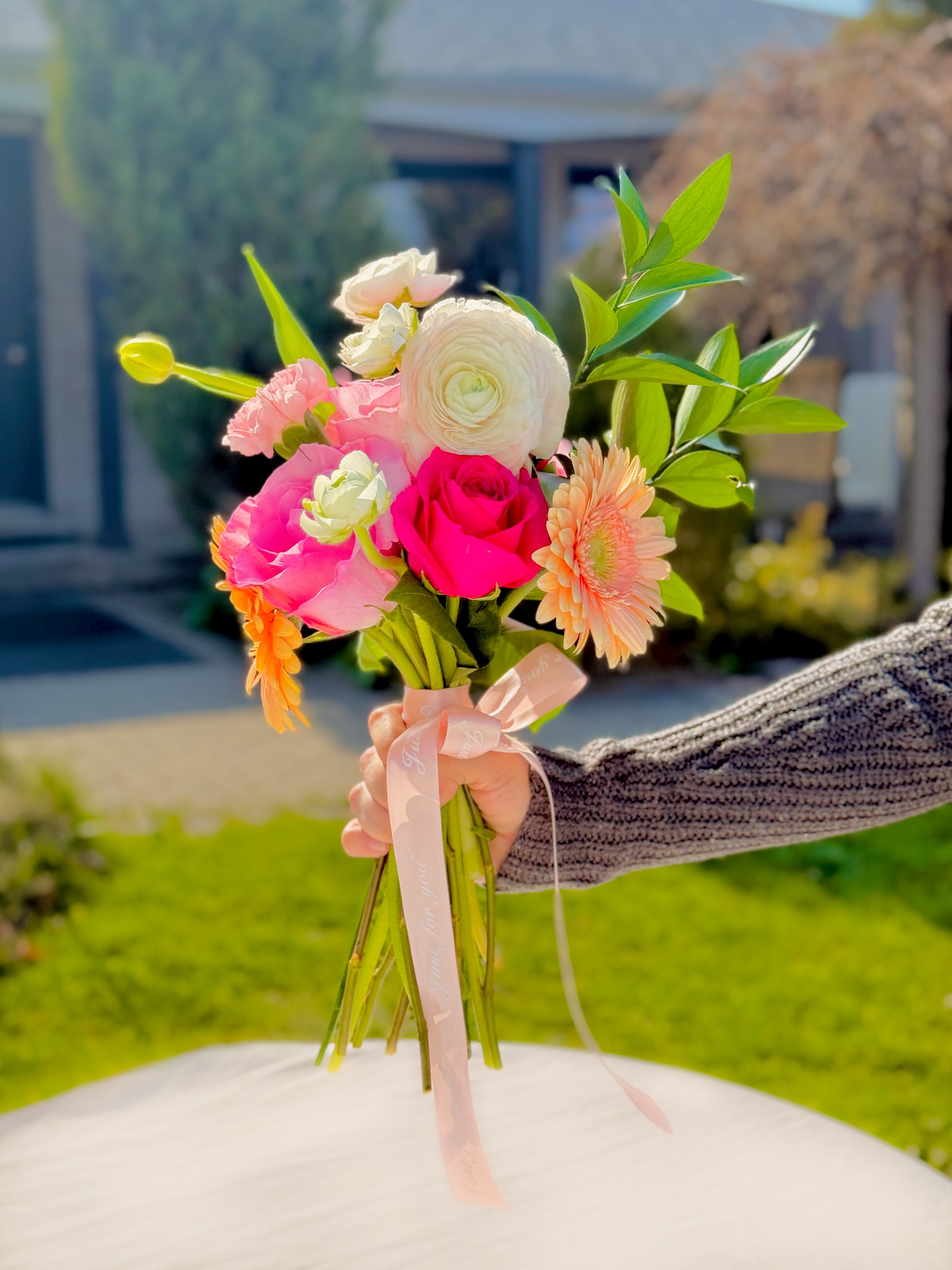 Hand-tied Mother’s Day flower bouquet with gerberas and seasonal blooms – jar not included