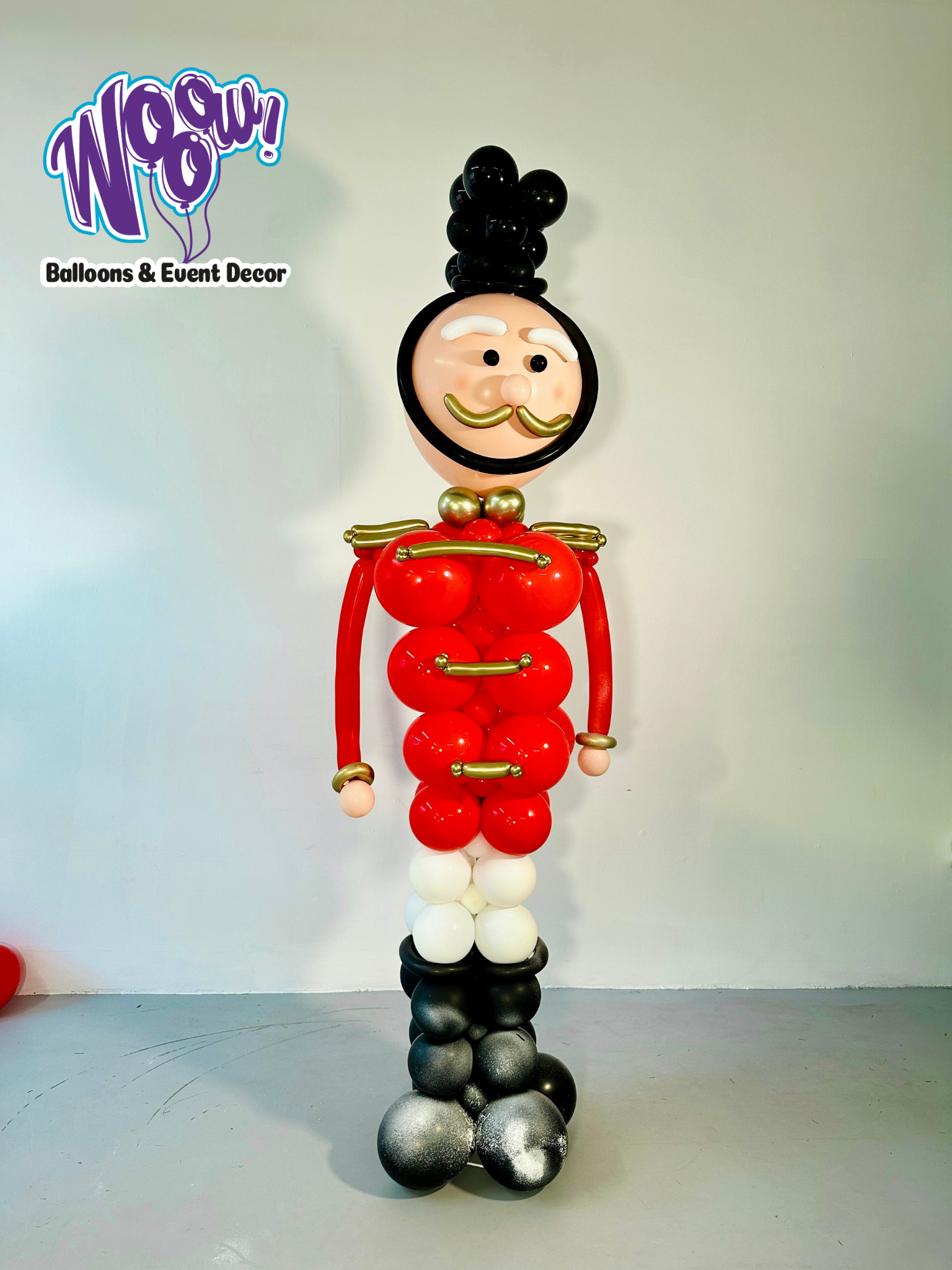 Nutcracker Balloon Sculpture standing 7-8 ft tall with festive colors in Toronto