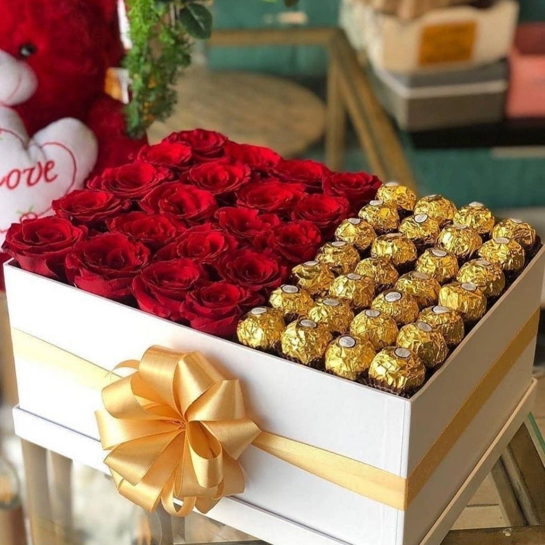 Elegant Roses & Chocolates Box with fresh red roses and Ferrero Rocher chocolates.