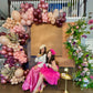 Luxury spring floral balloon garland with blush, gold, and greenery for elegant event decor.