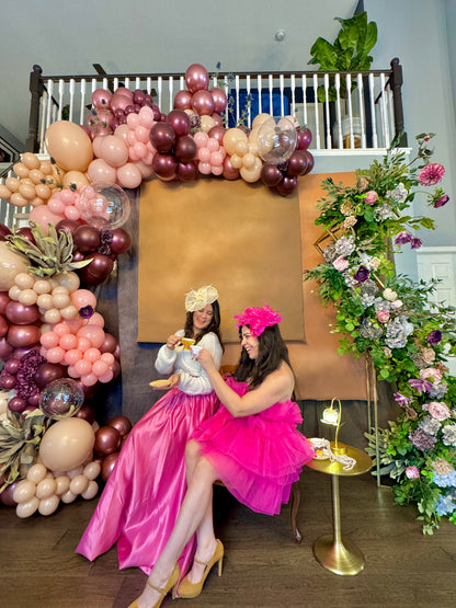 Luxury spring floral balloon garland with blush, gold, and greenery for elegant event decor.