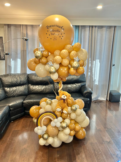 Teddy Bear Balloon Arrangement featuring a balloon display with a teddy bear and elegant balloon clusters, ideal for baby showers and newborn celebrations.
