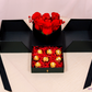 Luxury Black Heart Rose & Chocolate Gift Box with fresh red roses and Ferrero Rocher chocolates in a black box.